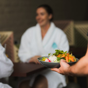 Pokebowl is brought to guests in bathrobe